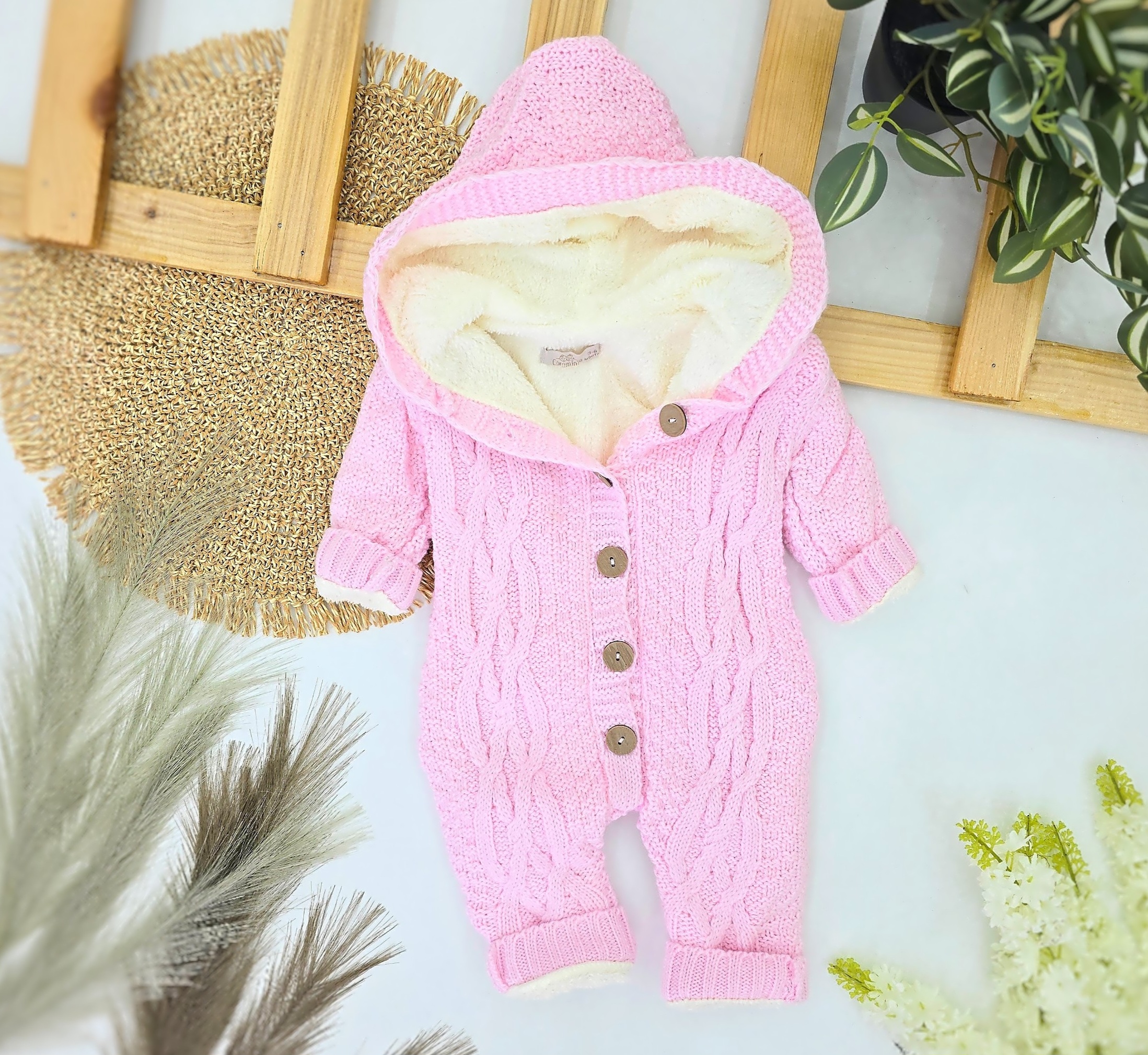 Pleteni zimski skafander za bebe – roze