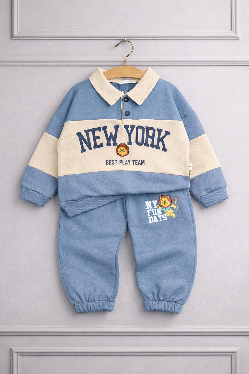 Plava trenerka za dečake sa kragnicom i lavićem